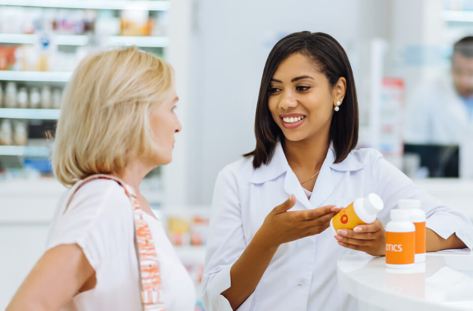 Pharmacist and Customer talking